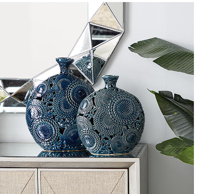 BLUE CERAMIC FLORAL VASE WITH CUT OUT PATTERNS,