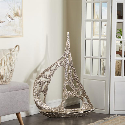 SILVER ALUMINUM SAIL BOAT SCULPTURE WITH CUT OUT DESIGNS