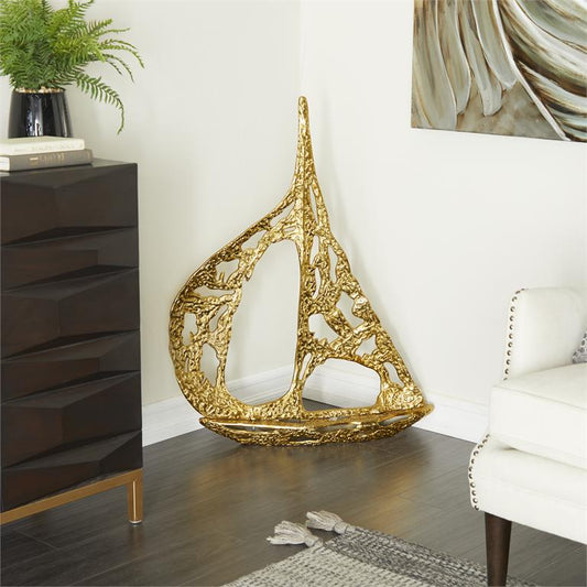 GOLD ALUMINUM SAIL BOAT SCULPTURE WITH CUT OUT DESIGNS