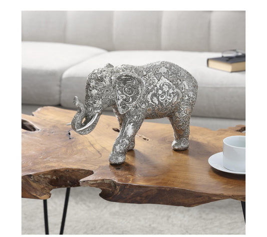 SILVER POLYSTONE ELEPHANT ENGRAVED FLORAL SCULPTURE, 6" X 14" X 9"