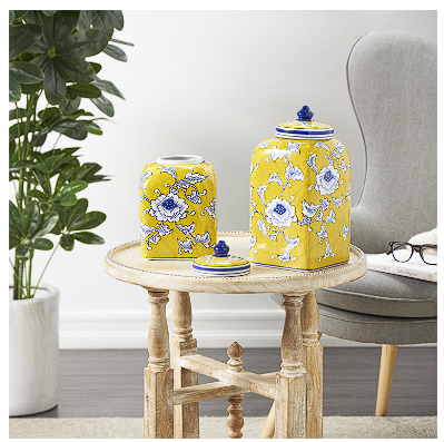 YELLOW CERAMIC FLORAL DECORATIVE JARS WITH BLUE AND WHITE ACCENTS