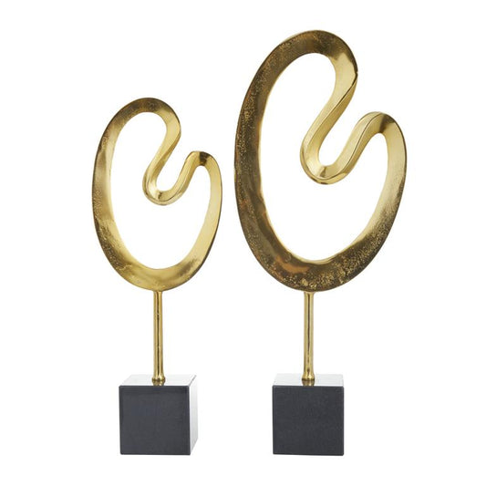 COSMOLIVING BY COSMOPOLITAN GOLD MARBLE ABSTRACT SCULPTURE WITH BLACK BASE
