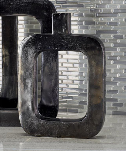 BLACK ALUMINUM VASE WITH CUT OUT FRAME
