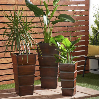 BROWN METAL INDOOR OUTDOOR LIGHT WEIGHT PLANTER WITH TAPERED BASE AND FLUTED DESIGN