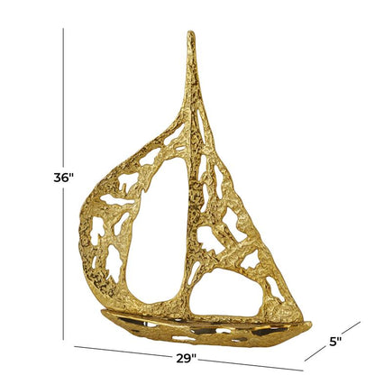 GOLD ALUMINUM SAIL BOAT SCULPTURE WITH CUT OUT DESIGNS